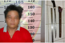 Tersangka penganiayaan, MG (50), beserta barang bukti parang yang diamankan di Mapolsek Tabalar.