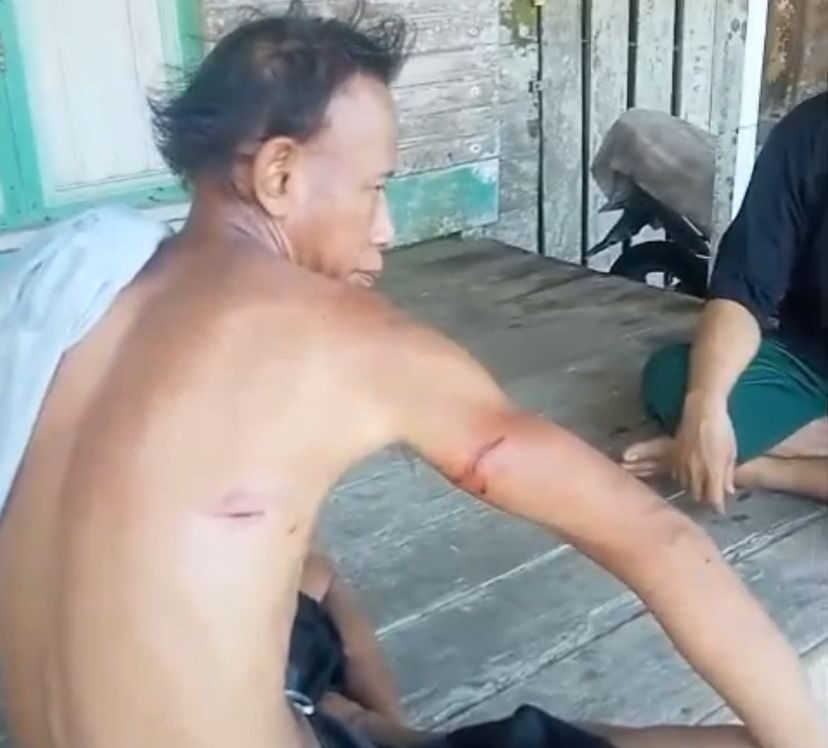 Potongan gambar warga Talisayan yang diterkam buaya.