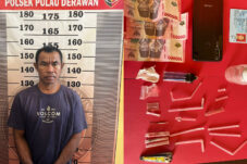 AH bersama barang bukti sabu dan lainnya yang diamankan Polsek Pulau Derawan.