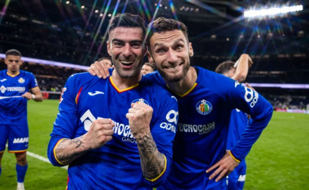 Selebrasi skuad Getafe usai membobol gawang Real Madrid. (getafecf.com)