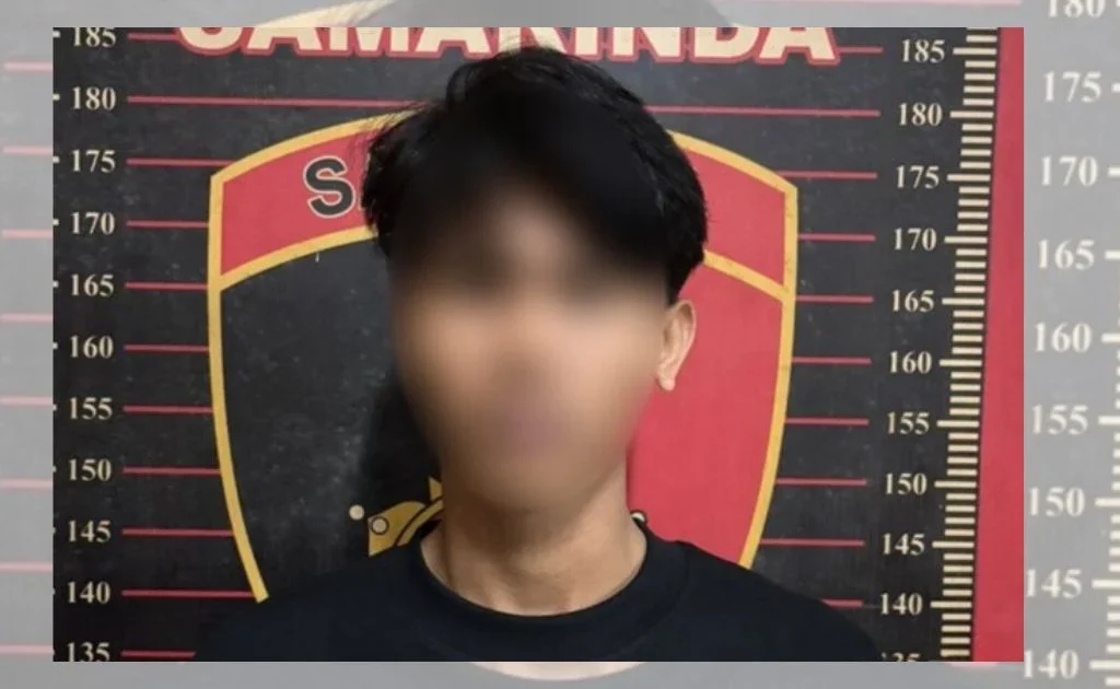 Tersangka A yang diamankan di Polresta Samarinda. (pranala)