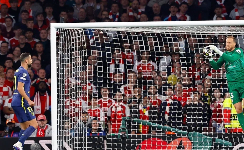 Aksi Kiper Atletico Jan Oblak vs Arsenal di Champions League. (Atleticodemadrid.com)