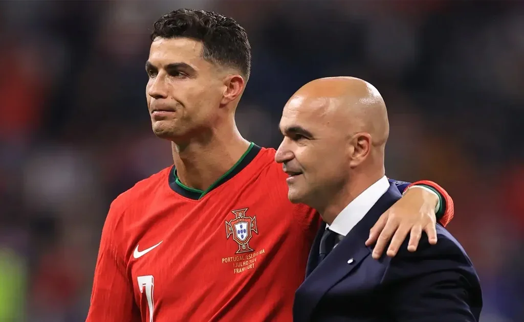 Roberto Martinez dan Cristiano Ronaldo (goal.com)