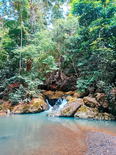 Pemandangan Air Terjun Bawan Batu, Kampung Merasa. (gmaps/Yusron Hadi)